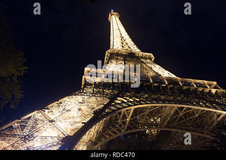 Paris, France - September 23, 2017: paris eiffel tower view from base. Tower travel. Travel to France. Breathtaking lights performance. The Eiffel Tower stirs your emotions. Stock Photo
