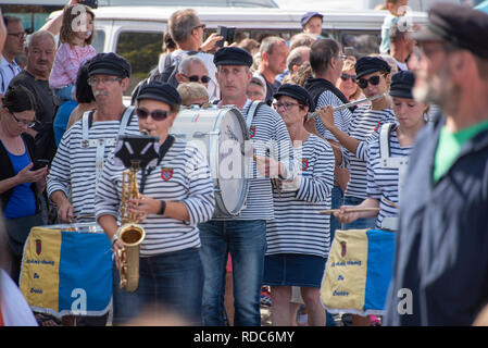 Band members in traditional outfits at the Fete de la Mer in Le Crotoy Stock Photo