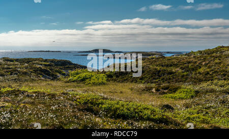 Heavy storm clouds over the rugged Atlantic coast with scattered islets. Norway, around Bud. Stock Photo