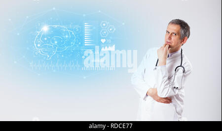 Middle aged neurologist showing the test result   Stock Photo