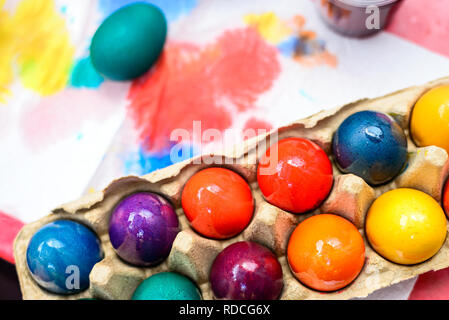 Freshly colored Easter eggs packaged in moulded carton box Stock Photo