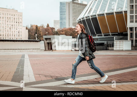 Smiling Kid going back home after school Stock Photo
