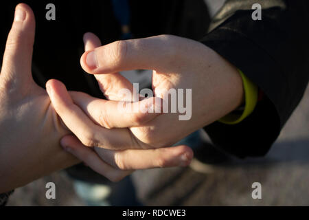 Cracking Knuckles Contest Stock Photo