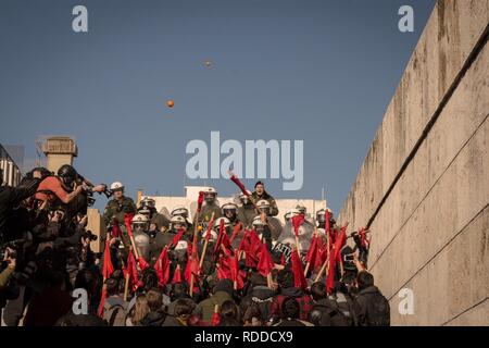 Protesters are seen clashing with riot police officers in front of Greek Parliament during the protest. Teachers from all over Greece demonstrate against a new law regulating for the appointment/hiring of permanent teaching staff in the public school system in Athens, Greece. Stock Photo