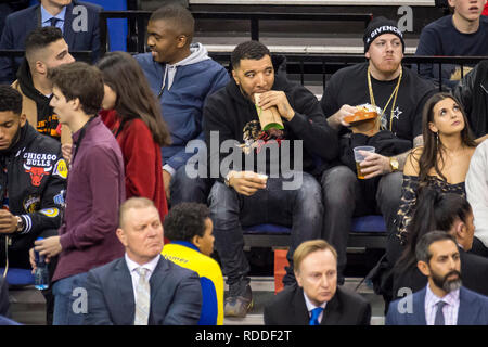 Londo , UK.  17 January 2019. Troy Deeney (C), Watford footballer, watches an NBA basketball game, NBA London 2019, between Washington Wizards and New York Knicks at the O2 Arena.  Final score: Wizards 101 Knicks 100.  Credit: Stephen Chung / Alamy Live News Stock Photo