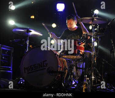 FORT LAUDERDALE FL - OCTOBER 8 :  Alex Turner, Matt Helders, Jamie Cook  of Arctic Monkeys performs at Revolution.  Arctic Monkeys are an English indie rock band. Formed in 2002 in High Green, a suburb of Sheffield, the band currently consists of Alex Turner (lead vocals, Lead/rhythm guitar), Jamie Cook (rhythm/lead guitar), Nick O'Malley (bass guitar, backing vocals) and Matt Helders (drums, percussion, backing vocals). Former members include Andy Nicholson (bass guitar, backing vocals) and Glyn Jones (lead vocals, rhythm guitar).  on October 8, 2011 in Fort Lauderdale, Florida.      People:  Stock Photo