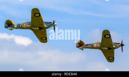 Formation of Two World War Two Veteran Hawker Hurricanes Flying Over Shuttleworth Stock Photo