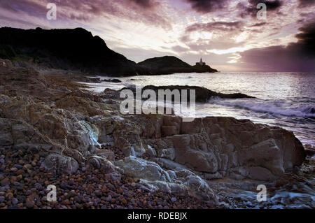 A dawn view of Mumbles Head in Swansea Bay, Wales. Stock Photo