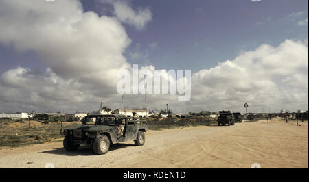 12th October 1993 U.S. Army Humvees and trucks inside the UNOSOM headquarters compound in Mogadishu, Somalia. Stock Photo