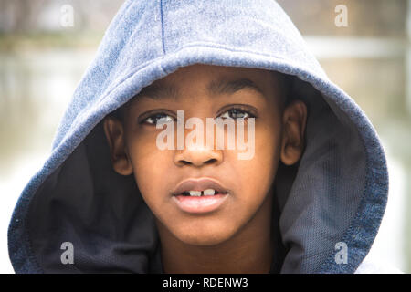 Close up of African American boy outside Stock Photo