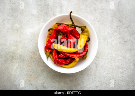 Pickled chili pepper in a bowl, spanish tapas, traditional food from spain Stock Photo