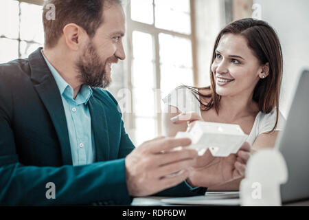 Couple of interior designers having discussion about their new project Stock Photo