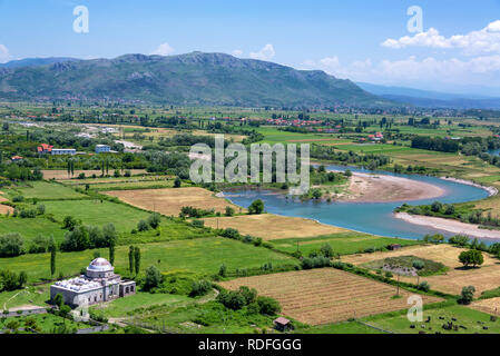 Lead mosque with lush green fields in Shkoder, Albania Stock Photo