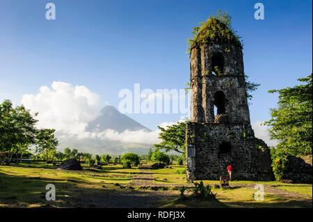 Cagsawa Ruins before volcano Mayon, Legazpi, Southern Luzon, Philippines Stock Photo