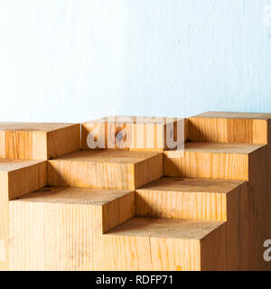 Geometric shapes in abstract blocks of wood with copy space Stock Photo