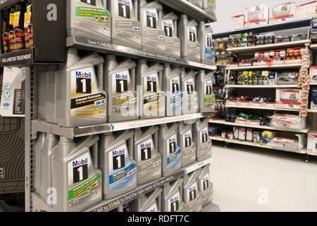 Motor oil bottles on shelves at Walmart store - USA Stock Photo