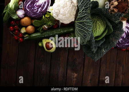 Composition with variety of raw organic vegetables and fruits. Balanced diet Stock Photo