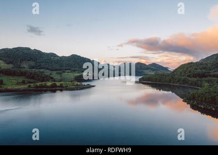 a lake in Norway with beautiful sunrise in background Stock Photo