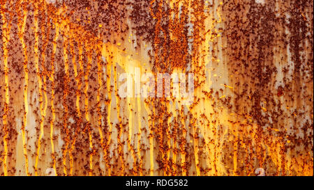 The Rusty painted metal texture, old iron surface with shabby cracked paint and scratches Stock Photo