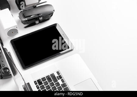 laptop and tablet near the drone, image on a white background, modern gadgets concept Stock Photo
