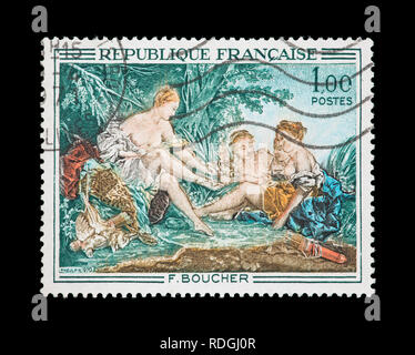 Postage stamp from France depicting the Francois Boucher painting 'Diana Returning From The Hunt' Stock Photo