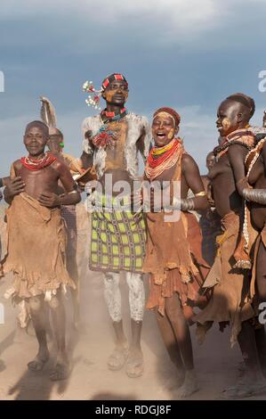 Karo people with body paintings participating in a tribal dance ceremony, Omo river valley, Southern Ethiopia, Africa Stock Photo