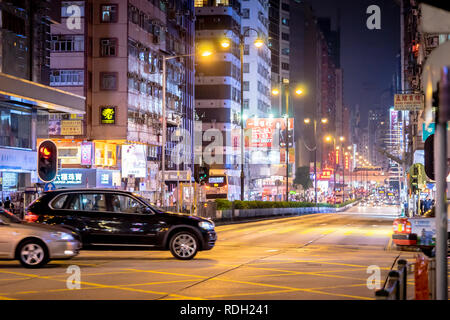 Hong Kong, Hong Kong - October 16, 2018: People are traveling in the night street of Nathan Road. Stock Photo