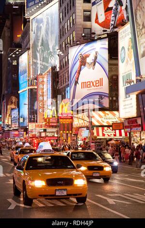 Times Square in the evening, Manhattan, New York, USA Stock Photo