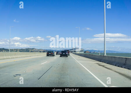 Driving on Richmond - San Rafael bridge (John F. McCarthy Memorial Bridge) on a sunny day, San Francisco bay, California Stock Photo