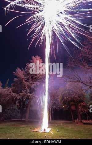 An amazing fireworks show during New Year's Eve celebration for the beginning of a happy new year on a nice Christmas in Spain at Madrid city Stock Photo
