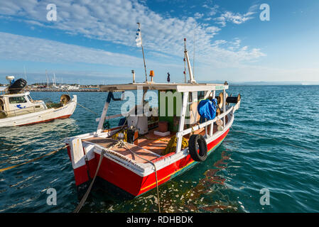 Katakolon, Greece - October 31, 2017: Colorful wooden fishing boats in harbor of the Katakolon (Olimpia), Greece. Stock Photo