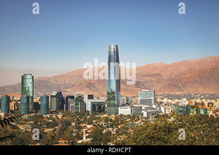 Aaerial view of Santiago skyline with Costanera skyscraper and Andes Mountains - Santiago, Chile Stock Photo