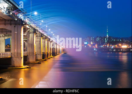 Banpo bridge rainbow fountain show at night in Seoul, Soth Korea. Stock Photo