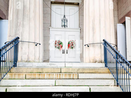 Christmas wreaths hang on the doors at Christ Church Cathedral, Dec. 23, 2018, in Mobile, Alabama. The church was established in 1823. Stock Photo