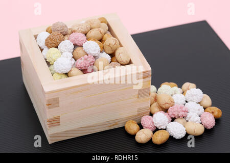 Japanese traditional event, soybean snacks are used on an annual event /Setsubun. Stock Photo