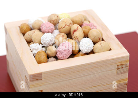 Japanese traditional event, soybean snacks are used on an annual event /Setsubun. Stock Photo