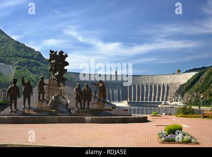 Monument to the builders of the Sayano–Shushenskaya hydro power plant on the Yenisei river in Siberia, Russia Stock Photo