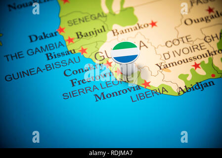 Sierra Leone marked with a flag on the map Stock Photo - Alamy