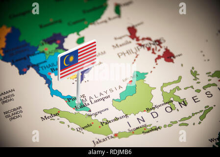 Malaysia marked with a flag on the map Stock Photo