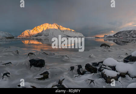 Sunset reflections in Lofoten, Norway Stock Photo