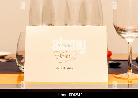 Christmas Menu laid on the table before dinner. Stock Photo