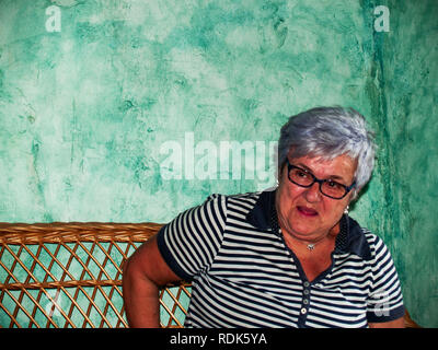 One senior woman smiling and showing happiness Stock Photo