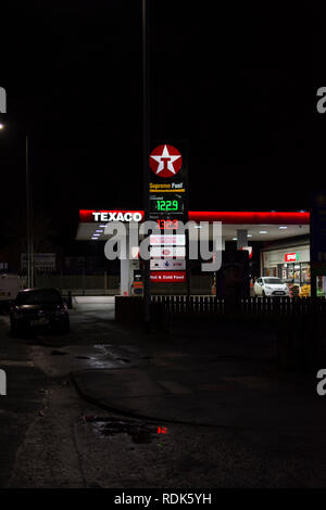 Texaco red Petrol and service station at night