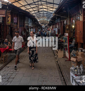 Gaziantep, Turkey - September 11, 2018: Tourists in the bakircilar (coppersmiths) bazaar of Gaziantep on September 11, 2018. Stock Photo