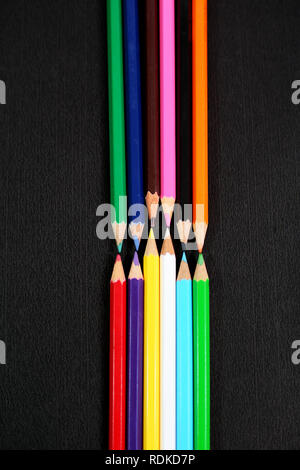 Different colored pencils. Isolated on the black background. Stock Photo