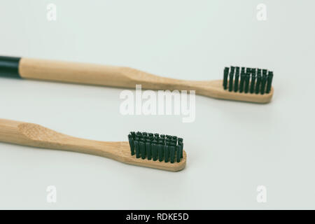 Bamboo toothbrush, closeup view, isolated on white background Stock Photo