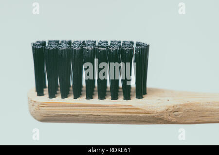 Bamboo toothbrush, closeup view, isolated on white background Stock Photo