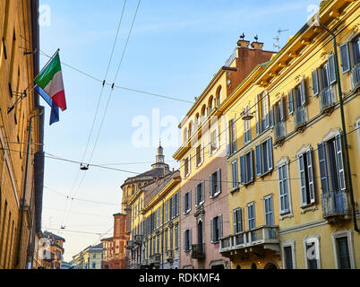 Corso Magenta street with the dome of the Basilica di Santa Maria delle Grazie in the background. Milan, Lombardy, Italy.