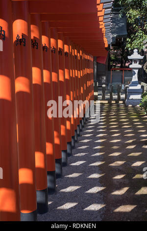 Kumamoto, Japan - November 11, 2018: Row of torii to the Izumi shrine in Suizenji Garden, Suizenji Jōjuen Stock Photo