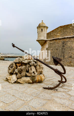 anchor at an ancient fortress in Lagos, Portugal Stock Photo